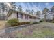 House exterior showcasing landscaping and walkway at 1481 Estes Rd, Rutledge, GA 30663