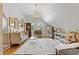 Sitting area with neutral decor, exposed brick, and hardwood floors at 527 Main St, Suwanee, GA 30024