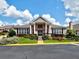 Community clubhouse with landscaping and inviting facade at 244 Camry Cir, Dallas, GA 30157