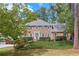 Brick home with gray roof, shutters, and landscaping at 4799 Fairville Ct, Marietta, GA 30062