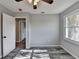 Bright bedroom with large window and gray walls at 6082 Ledgewood Dr, Forest Park, GA 30297