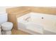 Main bathroom with a large soaking tub at 608 Woodknoll Ct, Jonesboro, GA 30238