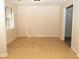 Simple dining room with neutral walls and tile floors at 608 Woodknoll Ct, Jonesboro, GA 30238