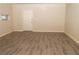 Living room with hardwood floors and plenty of natural light at 608 Woodknoll Ct, Jonesboro, GA 30238