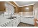 Kitchen offers ample counter space and white cabinets at 747 Bethesda School Rd, Lawrenceville, GA 30044