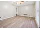 Light and airy living room with hardwood floors at 747 Bethesda School Rd, Lawrenceville, GA 30044