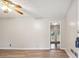 Bright living room with hardwood floors and ceiling fan at 747 Bethesda School Rd, Lawrenceville, GA 30044