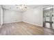 Bright living room featuring hardwood floors and ceiling fan at 747 Bethesda School Rd, Lawrenceville, GA 30044
