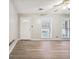 Living room with hardwood floors and view to backyard at 747 Bethesda School Rd, Lawrenceville, GA 30044