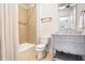 Bathroom with shower/tub combo, gray vanity, and tile flooring at 2765 Arden Nw Rd, Atlanta, GA 30327