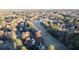 Aerial view of a golf course and community in the fall at 5003 Chapel Crossing, Douglasville, GA 30135