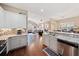 Open concept kitchen overlooking the living room, featuring granite counters at 224 Orchards Cir, Woodstock, GA 30188