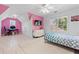 Pink bedroom with wood floor, white bed and home office area at 4125 Crowder Nw Dr, Kennesaw, GA 30152