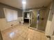 Updated bathroom with a large shower and tiled floors at 2893 Heather Dr, Atlanta, GA 30344