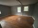 Bedroom with hardwood floors and gray walls at 2893 Heather Dr, Atlanta, GA 30344