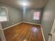 Bedroom with hardwood floors and gray walls at 2893 Heather Dr, Atlanta, GA 30344