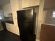 Modern kitchen with black appliances and white cabinets at 2893 Heather Dr, Atlanta, GA 30344