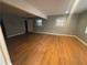 Spacious living room featuring hardwood floors and lots of natural light at 2893 Heather Dr, Atlanta, GA 30344