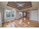 Main bedroom with hardwood floors, recessed lighting and multiple windows at 3365 Preservation Cir, Lilburn, GA 30047