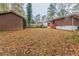 Backyard with shed and wooded area at 1962 Pine Oak Sw Dr, Atlanta, GA 30310