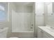 Clean bathroom with a shower/tub combo and white vanity at 1962 Pine Oak Sw Dr, Atlanta, GA 30310