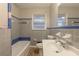 Bathroom with gray tile and a white vanity at 1962 Pine Oak Sw Dr, Atlanta, GA 30310