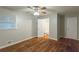 Bright bedroom with hardwood floors and an ensuite bathroom at 1962 Pine Oak Sw Dr, Atlanta, GA 30310