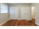 Spacious bedroom with hardwood floors and double closets at 1962 Pine Oak Sw Dr, Atlanta, GA 30310