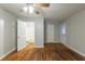 Living room with hardwood floors and access to bathroom at 1962 Pine Oak Sw Dr, Atlanta, GA 30310