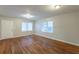 Spacious living room featuring hardwood floors and neutral walls at 1962 Pine Oak Sw Dr, Atlanta, GA 30310