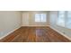 Living room with hardwood floors and neutral walls at 1962 Pine Oak Sw Dr, Atlanta, GA 30310