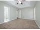 Large main bedroom with ceiling fan and carpet at 12027 Harbour Town Pkwy, Fayetteville, GA 30215