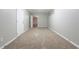 Spacious finished basement with neutral carpeting and ample natural light at 1215 Catalina Pkwy, Mcdonough, GA 30252