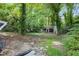 Large backyard with detached garage and mature trees at 1279 Kenilworth Sw Dr, Atlanta, GA 30310