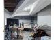 Unfinished basement with a bed and a TV at 1279 Kenilworth Sw Dr, Atlanta, GA 30310