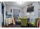 Small dining area with green chairs and a glass table at 1279 Kenilworth Sw Dr, Atlanta, GA 30310