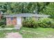Brick house with a front yard, and a white door at 1279 Kenilworth Sw Dr, Atlanta, GA 30310