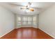 Spacious bedroom with hardwood floors and a bay window at 2940 Barnwood Xing, Duluth, GA 30097