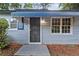 Black front door with decorative accents at 2436 Clarissa Nw Dr, Atlanta, GA 30318