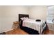 Charming bedroom with wood flooring and lots of natural light at 1496 Meadowlark Dr, Decatur, GA 30032