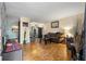 Living room with hardwood floors and stone fireplace at 1496 Meadowlark Dr, Decatur, GA 30032