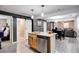 Open concept kitchen with island and stainless steel appliances at 406 Illinois Nw Ave, Atlanta, GA 30314