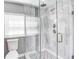 Walk-in shower with glass enclosure and stylish tile at 406 Illinois Nw Ave, Atlanta, GA 30314