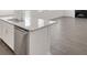 Kitchen island with granite countertop and stainless steel dishwasher at 514 Nolden Trl, Dacula, GA 30019