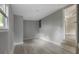 Spacious basement room with gray walls and wood-look flooring at 1321 Mcclelland Ave, Atlanta, GA 30344