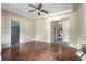 Hardwood floors and a ceiling fan in a spacious living room at 1321 Mcclelland Ave, Atlanta, GA 30344