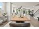 Modern dining room with a long wooden table and stylish chairs at 315 Sammon Way, Lawrenceville, GA 30046