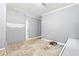 Unfinished basement with tiled floor and gray walls at 3530 Fairlane Nw Dr, Atlanta, GA 30331