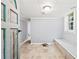 Unfinished basement with built-in bench seating and window at 3530 Fairlane Nw Dr, Atlanta, GA 30331