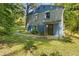 Ranch style home with gray brick and blue accents at 3530 Fairlane Nw Dr, Atlanta, GA 30331